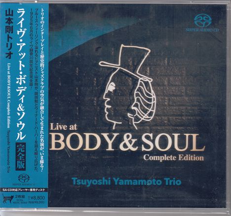 "Live at BODY & SOUL Complete Edition, Tsuyoshi Yamamoto Trio." Ein stilisiertes Profilbild eines Mannes mit Hut.