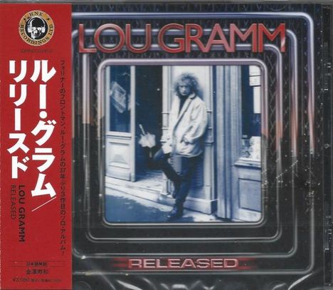 Texte oben: "LOU GRAMM". Unten: "RELEASED". Links rote Schrift vertikal. 
Illustration: Person lehnt an Gebäudeeingang.