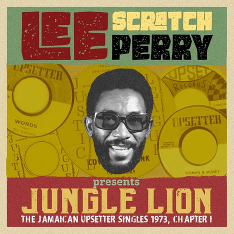 "LEE SCRATCH PERRY presents JUNGLE LION THE JAMAICAN UPSETTER SINGLES 1973, CHAPTER 1." Porträt eines Mannes vor Schallplatten.