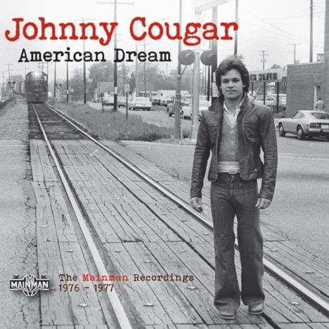 "Johnny Cougar American Dream. The Mainman Recordings 1976-1977." Ein Mann in Lederjacke steht an einem Gleis.