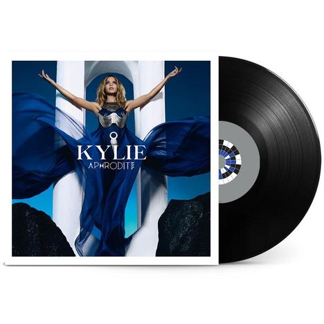 „KYLIE APHRODITE“ steht auf einem Albumcover mit einer Person, die ein blaues Kleid trägt, die Arme ausgebreitet. Eine Schallplatte ist daneben.