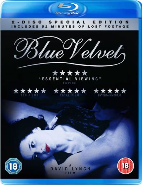 Text: "Blue Velvet," "2-Disc Special Edition," "Essential Viewing," "Empire," "BBC Films," "Total Film," "David Lynch Film."

Beschreibung: Ein Mann und eine Frau liegen nah beieinander. Oberer Bereich blau, zwei Altersfreigabesymbole.