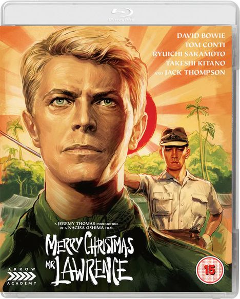 "Merry Christmas Mr. Lawrence." Namen: David Bowie, Tom Conti, Ryuichi Sakamoto, Takeshi Kitano, Jack Thompson. Illustration von zwei Männern.