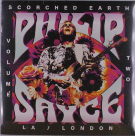 "Scorched Earth Volume Two LA/London Philip Sayce". Ein Gitarrist in farbenfrohem, blumigem Design.