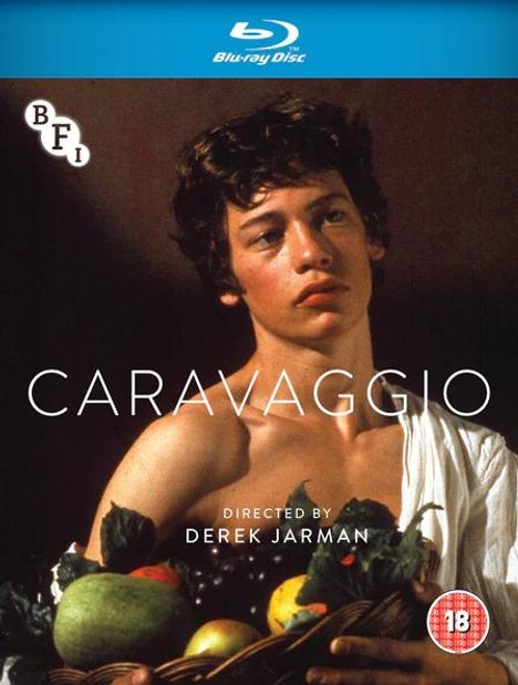 „CARAVAGGIO“ oben. Junge mit lockigem Haar, weißem Gewand, hält einen Obstkorb. BFI-Logo und „Directed by Derek Jarman“.