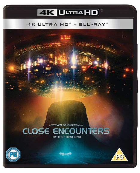"4K ULTRA HD™ + BLU-RAY™, A Steven Spielberg Film, Close Encounters of the Third Kind" darunter Berge und Lichter.