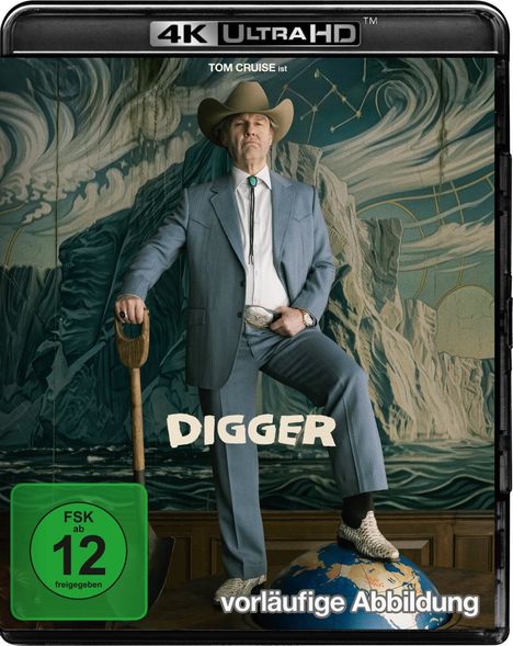 "Tom Cruise ist DIGGER, vorläufige Abbildung." Ein Mann im Anzug und Cowboyhut steht mit einem Fuß auf einem Globus.