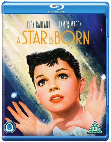„Judy Garland, James Mason, A Star is Born“ in großen Buchstaben. Frau mit ausdrucksstarkem Blick hebt Hände. Blu-ray-Hülle.