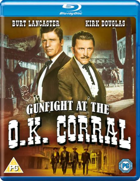 Text: "BURT LANCASTER. KIRK DOUGLAS. GUNFIGHT AT THE O.K. CORRAL." Zwei Männer im Wildwest-Look stehen im Vordergrund.