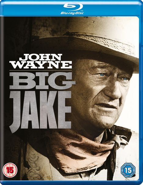 Text: "JOHN WAYNE BIG JAKE". Ein Mann mit Hut und Halstuch, ernster Blick, teilweise in Sepiatönen. Blu-ray Hülle.