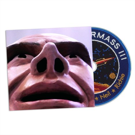 Der Text auf der CD sagt "QUATERMASS" und im Kreis "Neil Ritchie". Die Illustration zeigt ein Gesicht und ein Weltraummotiv.