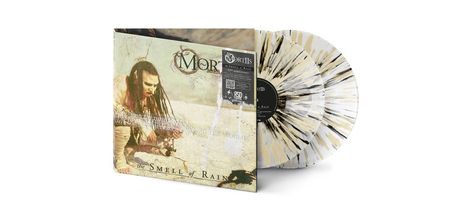 Text: "The Smell of Rain", "Mortiis". Bild: Mensch mit langen Haaren, zwei Schallplatten mit schwarzem und beigem Muster.