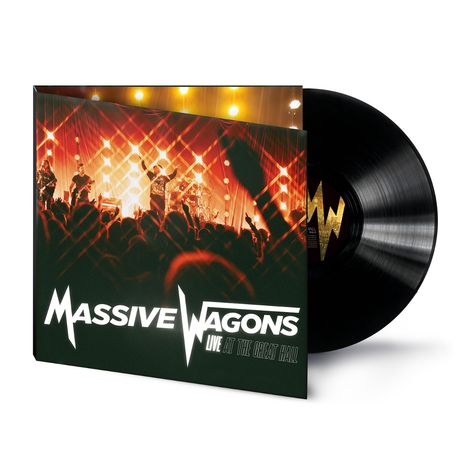 "Massive Wagons, Live at the Great Hall" auf einem Plattencover, darunter eine Vinylscheibe. Rockkonzert mit Lichteffekten.