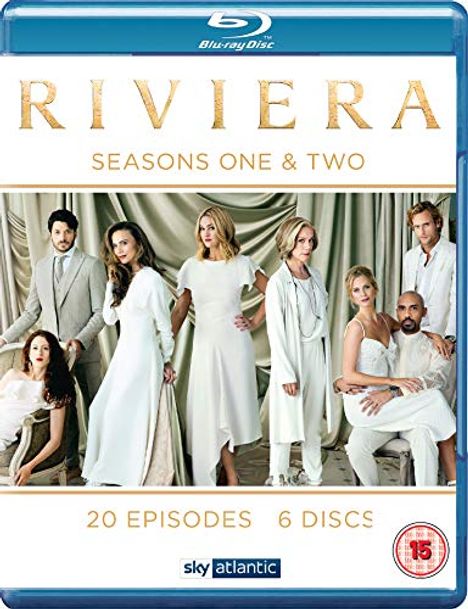 RIVIERA, SEASONS ONE & TWO. 20 EPISODES, 6 DISCS. Eine Gruppe elegant gekleideter Menschen in Weiß vor einem Vorhang.