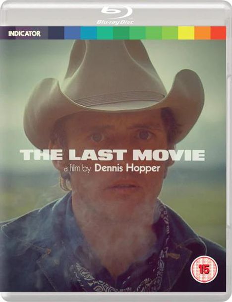 „THE LAST MOVIE, a film by Dennis Hopper“. Ein Mann mit Cowboyhut schaut ernst, im Hintergrund eine Landschaft.