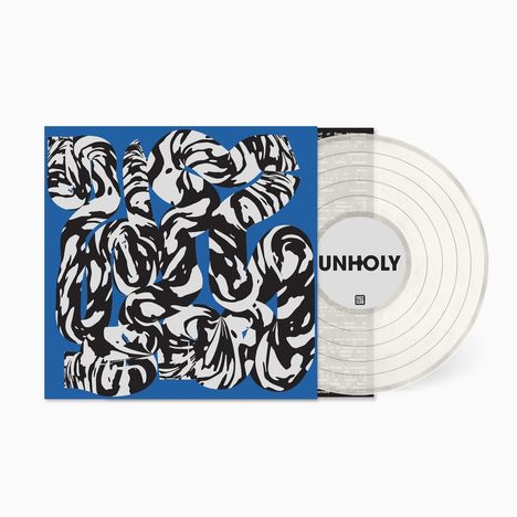 "UNHOLY" steht in der Mitte einer durchsichtigen Schallplatte. Links ist ein blaues Cover mit abstraktem schwarz-weißem Muster.