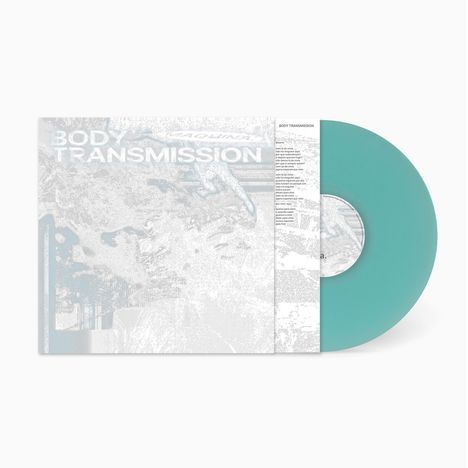 TEXT: "BODY TRANSMISSION" auf dem Cover. Türkise Vinyl-Schallplatte rechts neben dem Cover.
