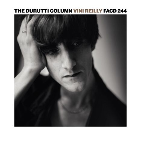 Text: "THE DURUTTI COLUMN VINI REILLY FACD 244". Schwarz-weißes Porträt eines nachdenklichen Menschen.