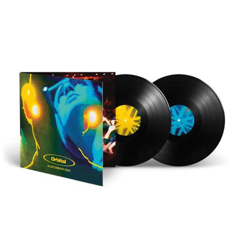 Text: "Orbital Glastonbury 1994." Zwei schwarze Schallplatten, farbenfrohes Cover mit abstraktem Gesicht.