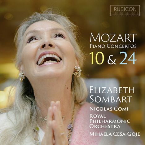 Text: "MOZART Piano Concertos 10 & 24. Elizabeth Sombart, Nicolas Comi, Royal Philharmonic Orchestra, Mihaela Cesa-Goje." Frau lächelt.