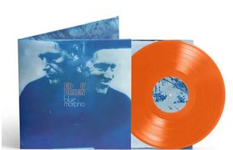 Text: "Blue Morphine". Blaues Albumcover mit zwei Gesichtern. Orangefarbene Vinyl-Schallplatte.