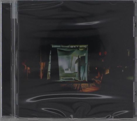 Keine erkennbaren Texte. Eine düstere Szene mit einem beleuchteten Raum im Zentrum auf einem CD-Cover.
