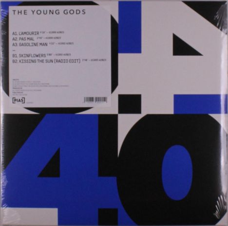 Text: "THE YOUNG GODS", Liederliste mit Titeln wie "L'AMOURIR" und "KISSING THE SUN". Blau-schwarze grafische Muster.
