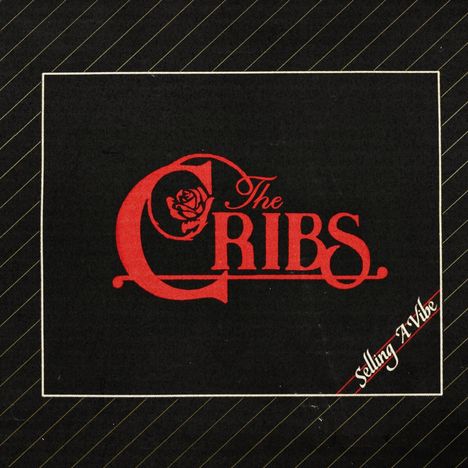 "The Cribs" in roter Schrift mit Rosenskizze, schräge Aufschrift "Selling A Vibe" unten rechts, schwarzer Hintergrund.