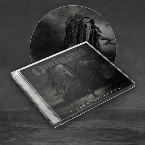 „Ominous“ und „Lake of Tears“ sind zu sehen. Ein surrealistisches Cover zeigt mystische, baumartige Wesen.