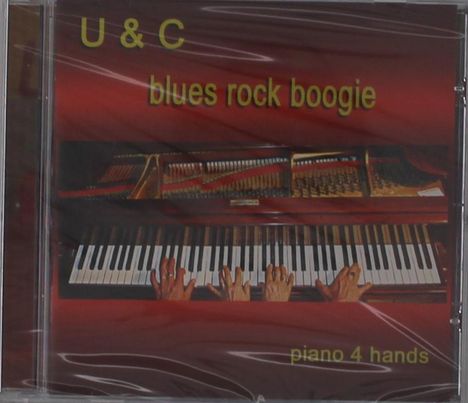 Oben steht "U & C", darunter "blues rock boogie". Zwei Hände spielen auf einer Klaviertastatur.