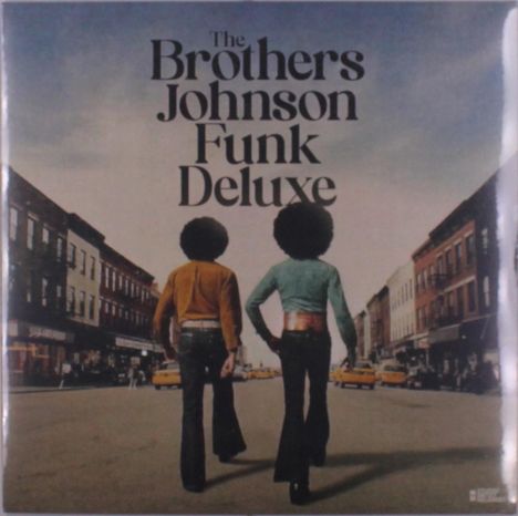 Text: "The Brothers Johnson Funk Deluxe." Zwei Personen laufen auf einer Straße, im Hintergrund sind Gebäude und gelbe Taxis.
