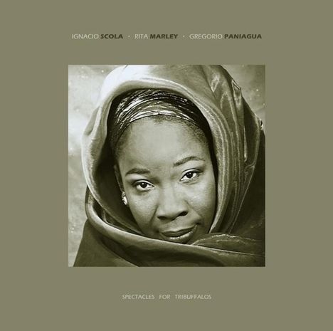 IGNACIO SCOLA - RITA MARLEY - GREGORIO PANIAGUA. Darunter: "SPECTACLES FOR TRIBUFFALOS". Schwarz-weiß Porträt einer Frau.
