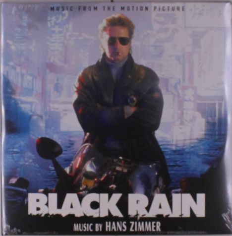 Text: "BLACK RAIN", "Music by Hans Zimmer". Eine Person in Lederjacke und Sonnenbrille steht vor einer beleuchteten Stadt.