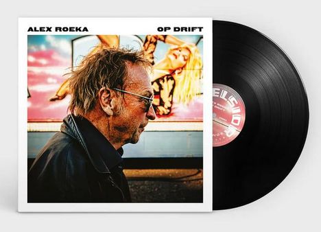 "Alex Roeka" und "Op Drift" oben. Cover zeigt einen Mann im Profil vor einer farbenfrohen Wand mit Frauengestalt. Schallplatte sichtbar.