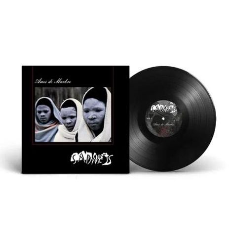 "Armut in Mexiko", Album-Cover mit drei in helle Decken gehüllten Personen, Schallplatte daneben, Logo "Sadness" unten.