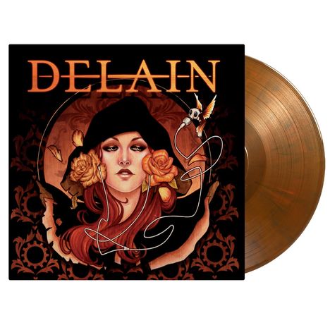 „DELAIN“ in großer Schrift auf einem Cover mit Illustrationen einer Frau mit Blumen und einem Vogel mit Mikrofon.