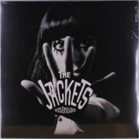 Text: "The Jackets Essentials". Eine schwarz-weiße Aufnahme: Hand vor dem Gesicht einer Person, dramatisches Licht.