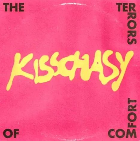 Text: "Kisschasy", "The Terrors of Comfort". Hintergrund: Pink; Text: Gelb und Schwarz.