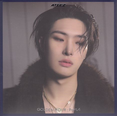 ATEEZ. GOLDEN HOUR: Part.4. Eine Person mit nassem Haar und Halsketten blickt nachdenklich.