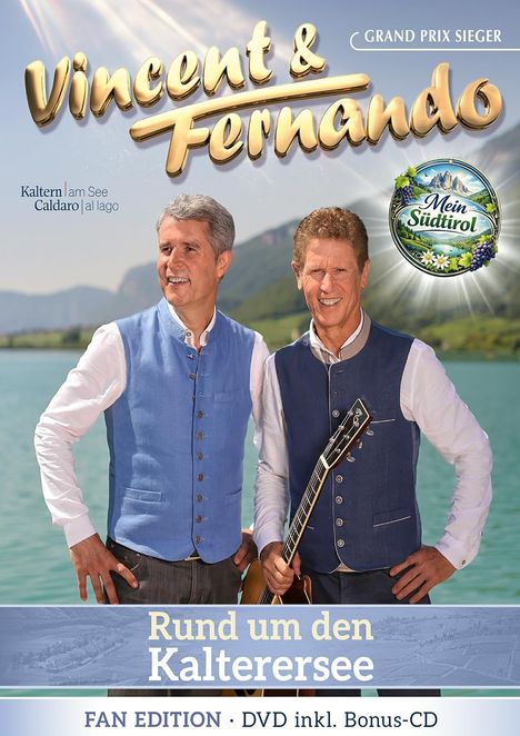 Texte: "Vincent & Fernando", "Rund um den Kalterersee". Zwei Männer in Trachten vor einem See und Bergen. Logo mit "Mein Südtirol".