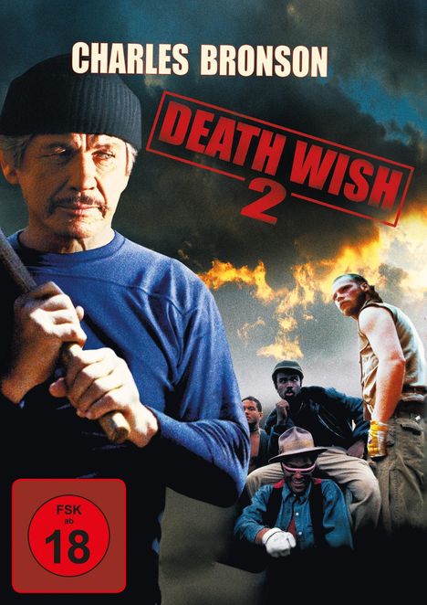„CHARLES BRONSON“, „DEATH WISH 2“, „FSK ab 18“. Ein Mann mit Mütze und Knüppel, dahinter mehrere Personen und brennender Himmel.