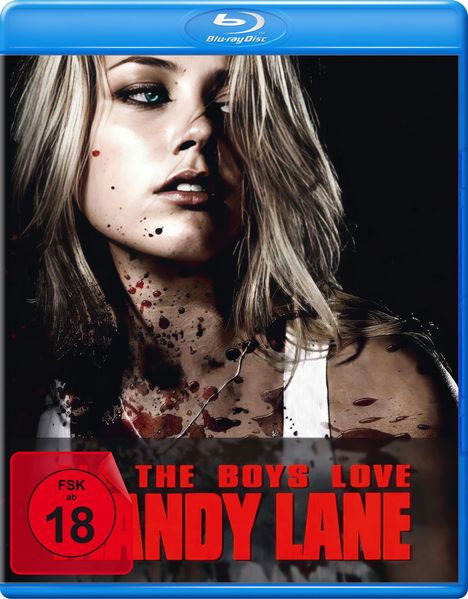 Roter Text: "THE BOYS LOVE MANDY LANE". FSK 18 Symbol. Porträt einer jungen Frau mit blonden Haaren und Blutspritzern.