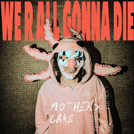 Text in großen roten Buchstaben: "WE'RE ALL GONNA DIE". Darunter eine Person in einem hellen Anzug mit Clownmaske.