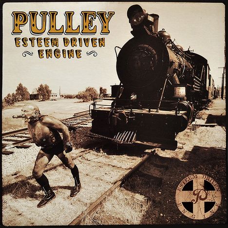 "PULLEY ESTEEM DRIVEN ENGINE" in großen Buchstaben. Im Hintergrund zieht ein Mann einen alten Zug an einem Kettenzug.