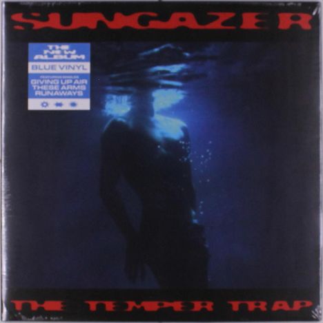 "SUNGAZER", "THE NEW ALBUM", "BLUE VINYL", "GIVING UP AIR", "THESE ARMS", "RUNAWAYS", "THE TEMPER TRAP". Silhouette unter Wasser.