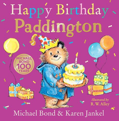 "Happy Birthday Paddington." Ein fröhlicher Bär mit Partyhut hält eine Geburtstagstorte, umgeben von Geschenken und Luftballons.