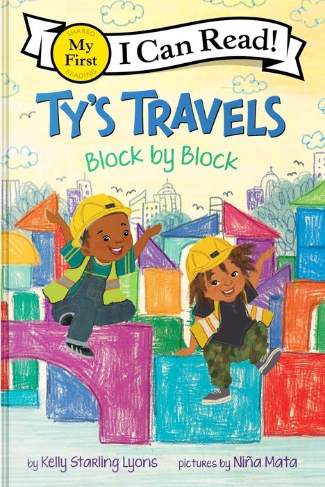 "I Can Read! Ty’s Travels: Block by Block." Zwei fröhliche Kinder in Baumeisterkleidung vor bunter Stadtsilhouette.