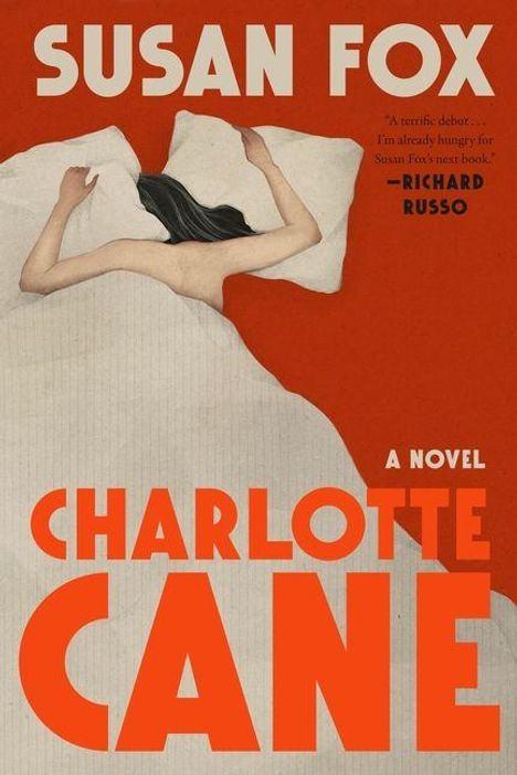 "Susan Fox, Charlotte Cane: A Novel. Eine Frau mit dunklem Haar liegt auf einem Bett mit weißen Laken."