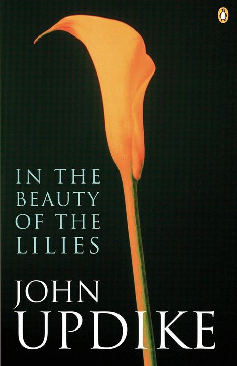 IN THE BEAUTY OF THE LILIES, JOHN UPDIKE. Orange Calla-Lilie vor schwarzem Hintergrund. Penguin-Logo oben rechts.