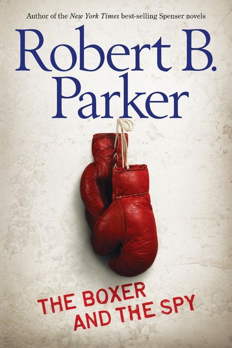 "Robert B. Parker"; "The Boxer and the Spy". Zwei rote Boxhandschuhe hängen an einem Seil vor einem hellen Hintergrund.